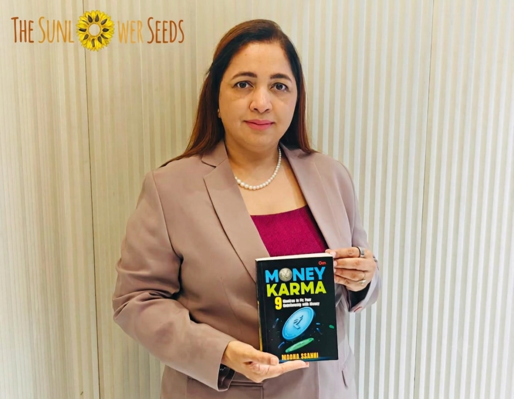 Moona Ssahni holding her debut book Money Karma at the launch
