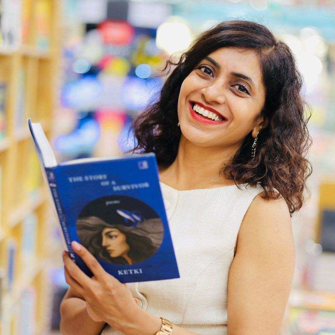 Ketki Saxena holding The Story of a Survivor